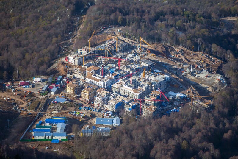 Sochi, Russia. Krasnaya Polyana - former Gorky Gorod mountain ski resort - under construction. Upper Town at 960 royalty free stock images