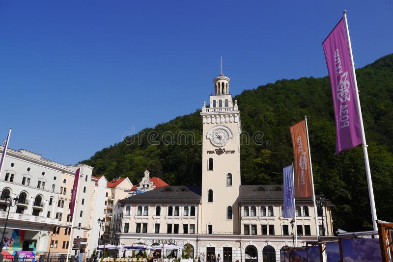 Town hall with Clock tower in Rosa Khutor. Sochi, Russia stock photos